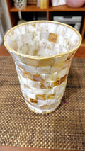 Handcrafted tapered vase with mother of pearl mosaic, featuring intricate shell patterns and a smooth, elegant shape.
