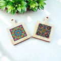 Handcrafted diamond art wood cutting board with intricate diamond pattern and smooth finish, ideal for kitchen use.