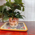 Colorful handcrafted mandala mosaic serving tray with intricate patterns, ideal for serving snacks or decorative display.
