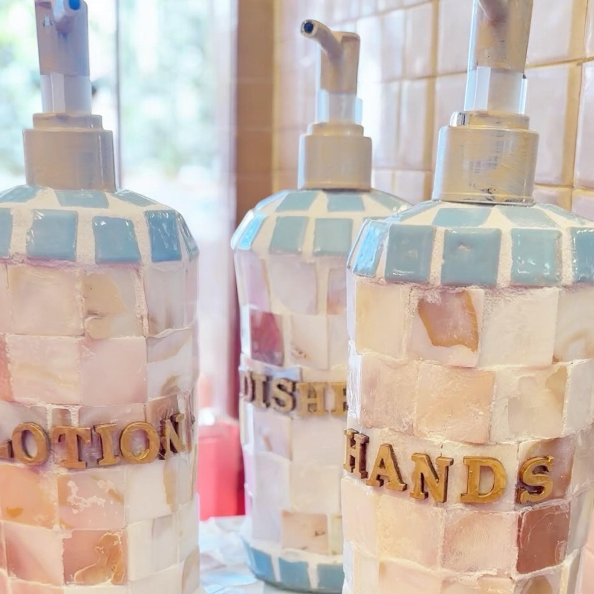Handmade iridescent mother of pearl mosaic soap with shimmering, colorful surface, showcasing intricate mosaic design.