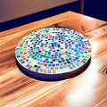 Handcrafted 10-inch rainbow mosaic plant stand by Miss Bette's Creations with colorful tiled design and sturdy ceramic base.