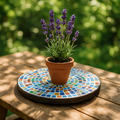Handcrafted round rainbow mosaic plant stand with colorful tiled design, ideal for displaying indoor and outdoor plants.