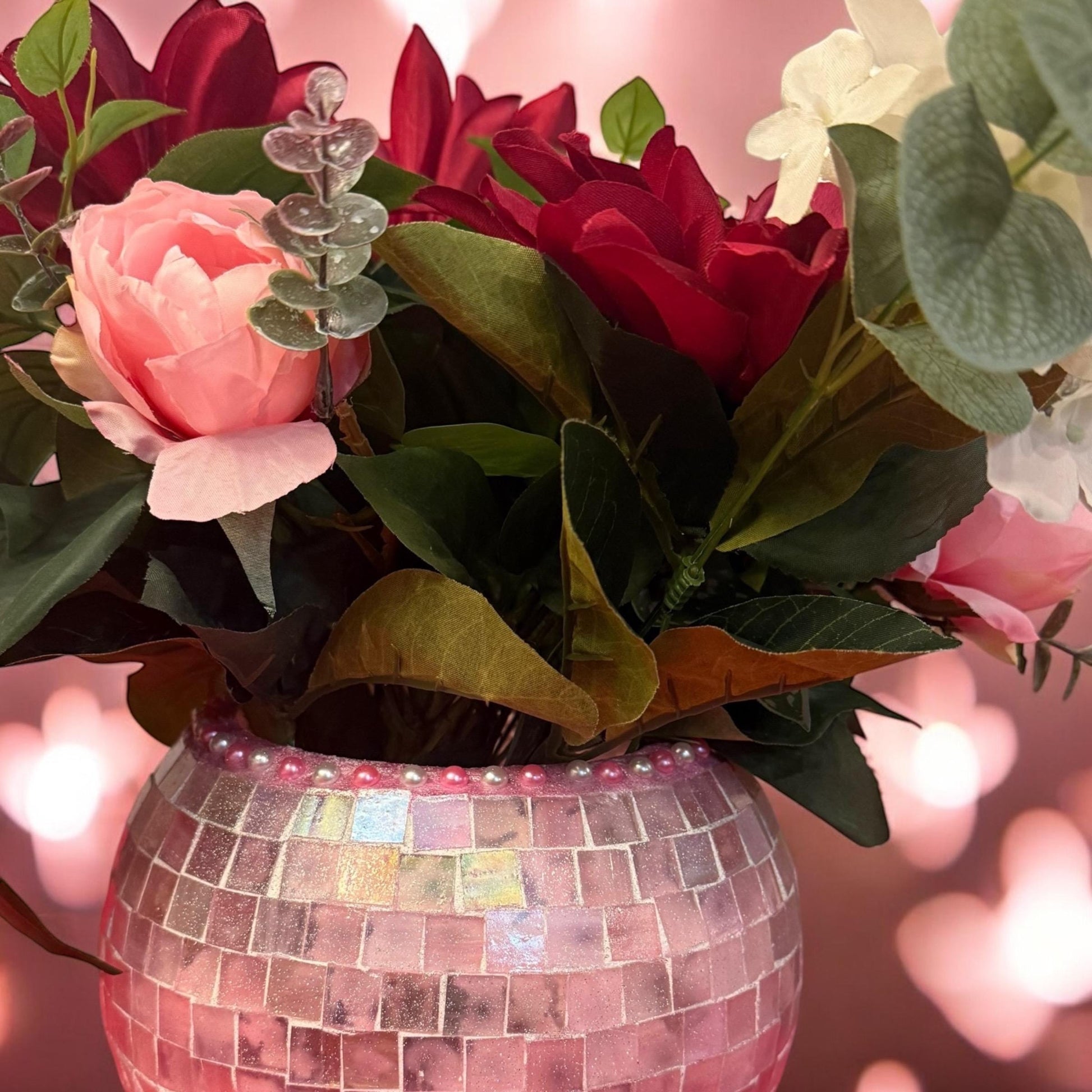 Blush rose mosaic globe vase with intricate glass pattern, perfect for floral arrangements or decorative displays.