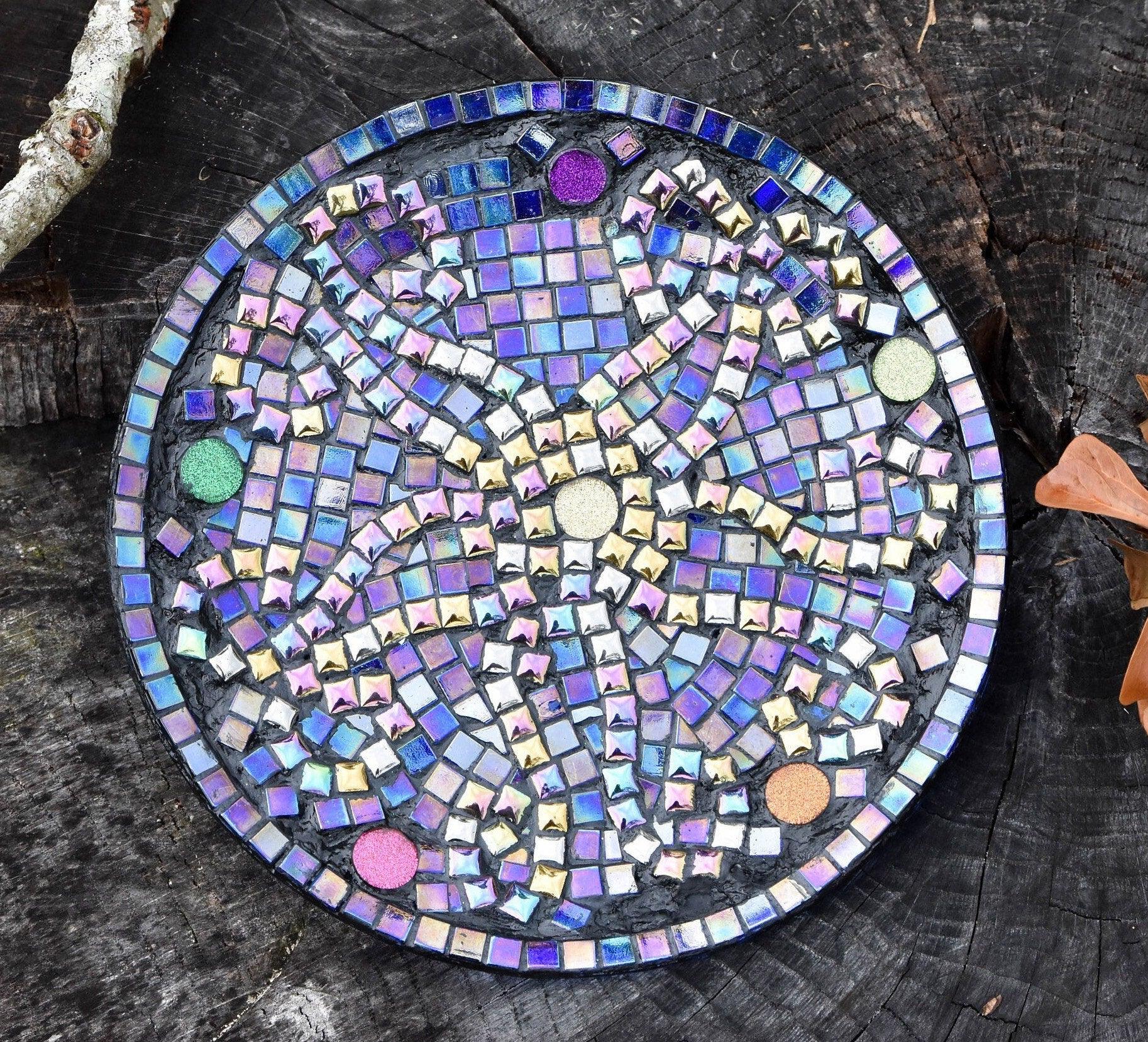 Handcrafted iridescent mosaic wall art with colorful glass pieces, showcasing intricate design and vibrant reflective surfaces.