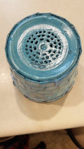 Turquoise mother of pearl flower pot with floral design, decorative ceramic planter for indoor or outdoor use