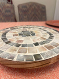 Handcrafted wooden mosaic plant stand with colorful tile design, sturdy structure, and natural finish for indoor or outdoor use.