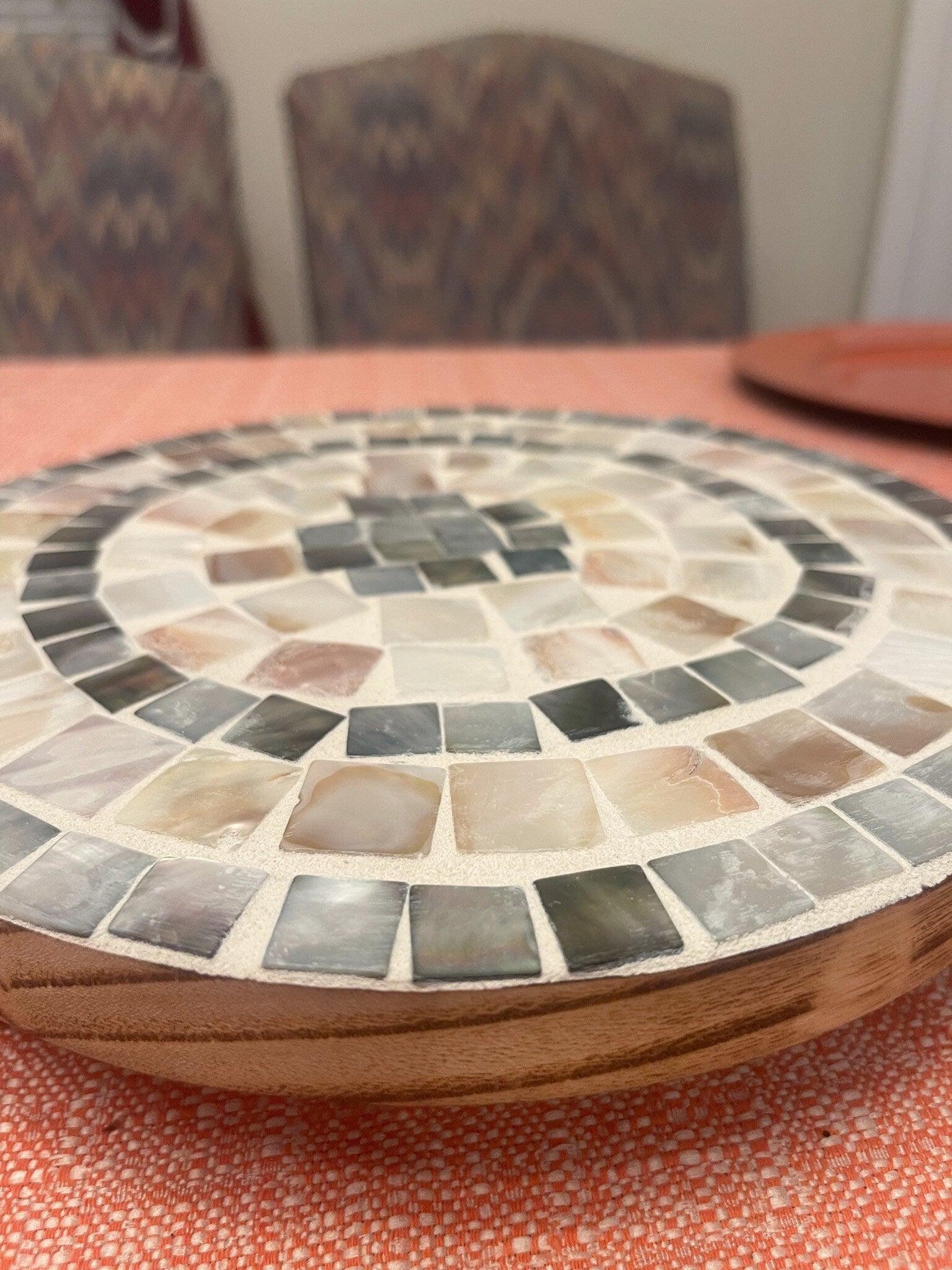 Handcrafted wooden mosaic plant stand with colorful tile design, sturdy structure, and natural finish for indoor or outdoor use.