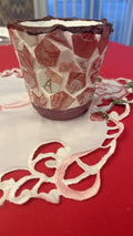 Handcrafted broken china mosaic flower pot with colorful floral design, showcasing intricate mosaic patterns and vibrant craftsmanship.