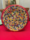 Colorful handcrafted rainbow mosaic decorative plate with vibrant glass tiles, showcasing intricate design and artistic craftsmanship.
