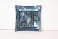 Handcrafted mosaic mirror glass dish with colorful, intricate tile design, ideal for decorative or display purposes.