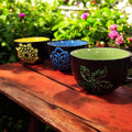 Handpainted extra large coffee mug from My Store with colorful floral design on white ceramic.