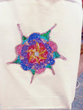 Handmade sparkling starburst diamond art canvas tote bag with colorful starburst design and sturdy handles.