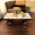 Vintage hand-carved wooden pedestal stand with intricate detailing, ideal for displaying decorative items or artwork.