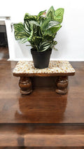 Vintage hand-carved wooden pedestal stand with intricate detailing, ideal for displaying art or decorative items.