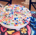 White rainbow mosaic plant stand with handcrafted design, featuring colorful tile patterns and sturdy construction.