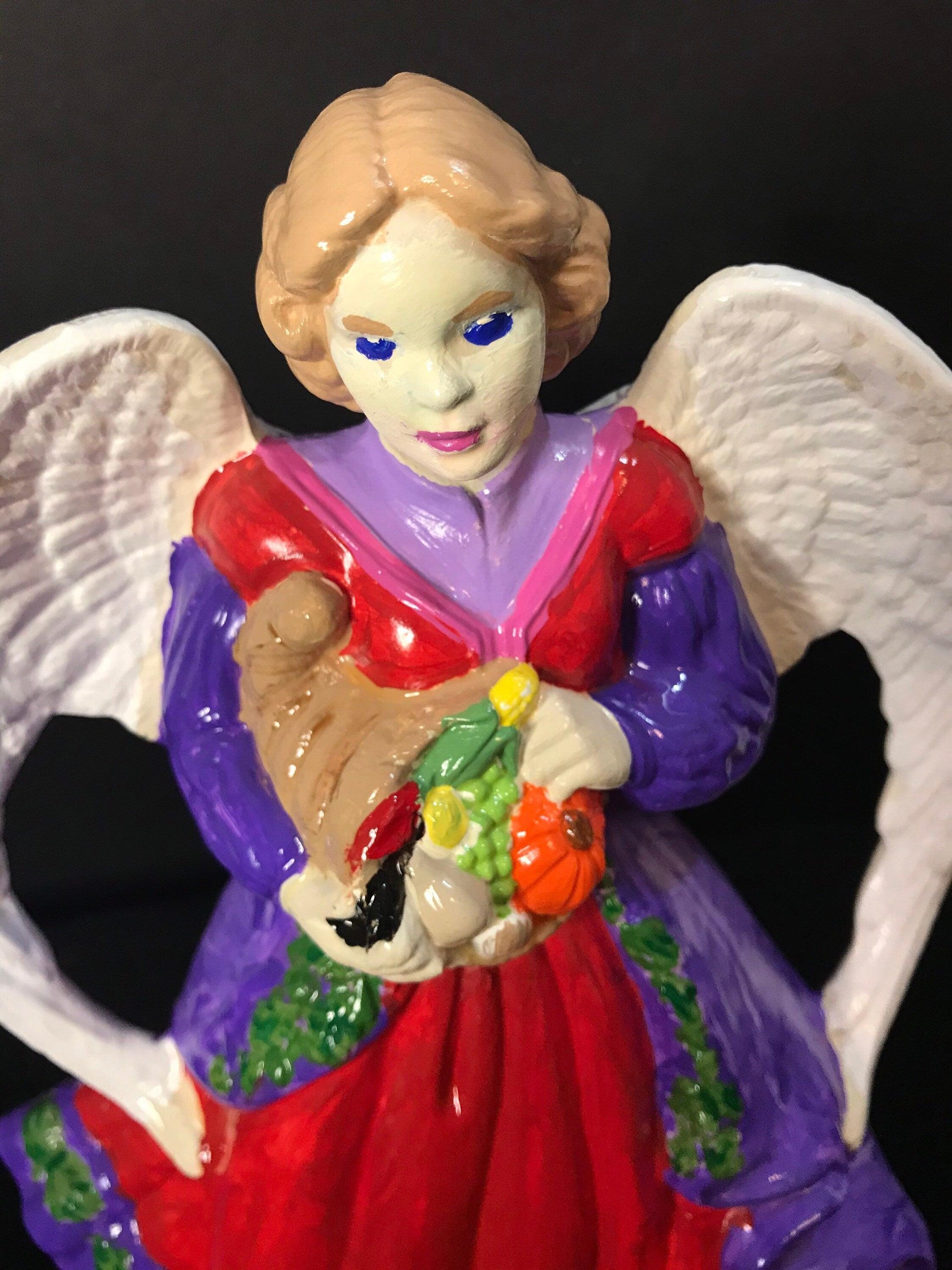 Hand-painted Harvest Angel figurine with detailed wings and autumn-themed attire, crafted by My Store.