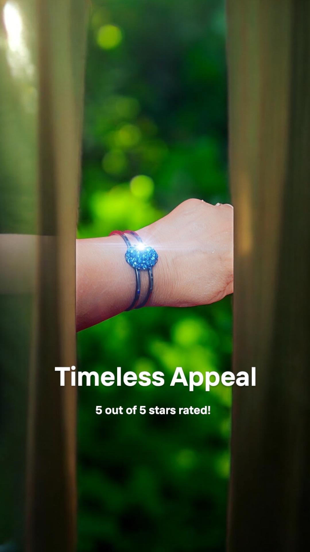 Deep blue glass cuff bracelet with smooth finish and open design, stylish accessory perfect for everyday wear.