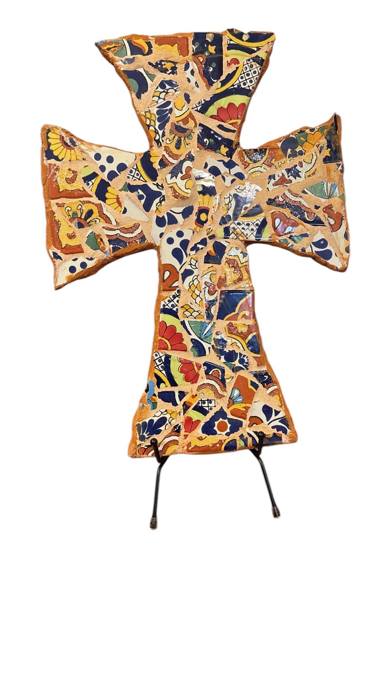 Colorful Mexican mosaic tile Christian wall cross with intricate patterns and vibrant design, suitable for religious home decor.