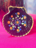 Hand painted ceramic ring dish with colorful floral design, perfect for jewelry storage and decorative use.
