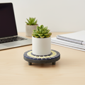 Handmade cobalt blue and yellow mosaic plant stand with intricate tile design and sturdy metal frame.