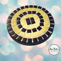 Handmade cobalt blue and yellow mosaic plant stand with intricate tile design and sturdy metal frame.