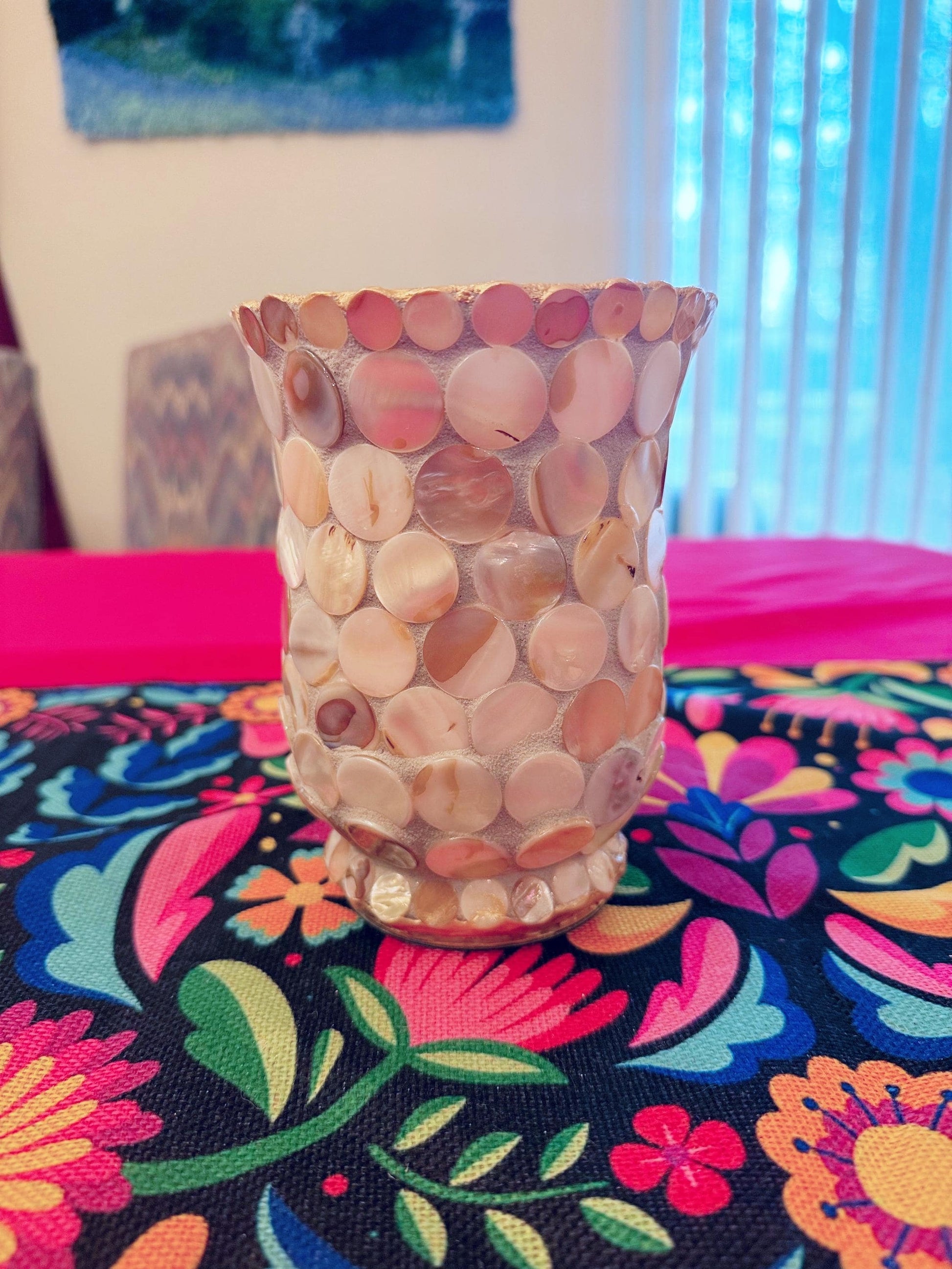 Handcrafted scalloped Capiz shell mosaic vase with a smooth, rounded shape and shimmering shell pattern.