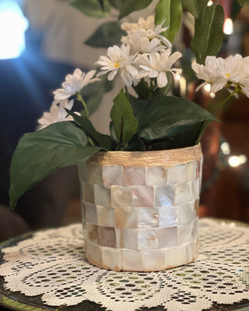 Handcrafted mother of pearl mosaic flower pot with colorful floral design, showcasing intricate craftsmanship and vibrant details.
