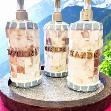 Handcrafted mosaic soap and lotion dispenser set with colorful tile design, made for kitchen or bathroom use.