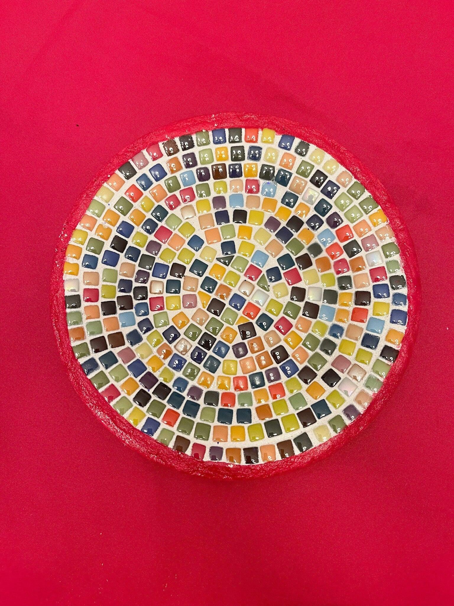 Colorful handcrafted rainbow mosaic decorative plate featuring vibrant glass pieces, ideal for home decor.