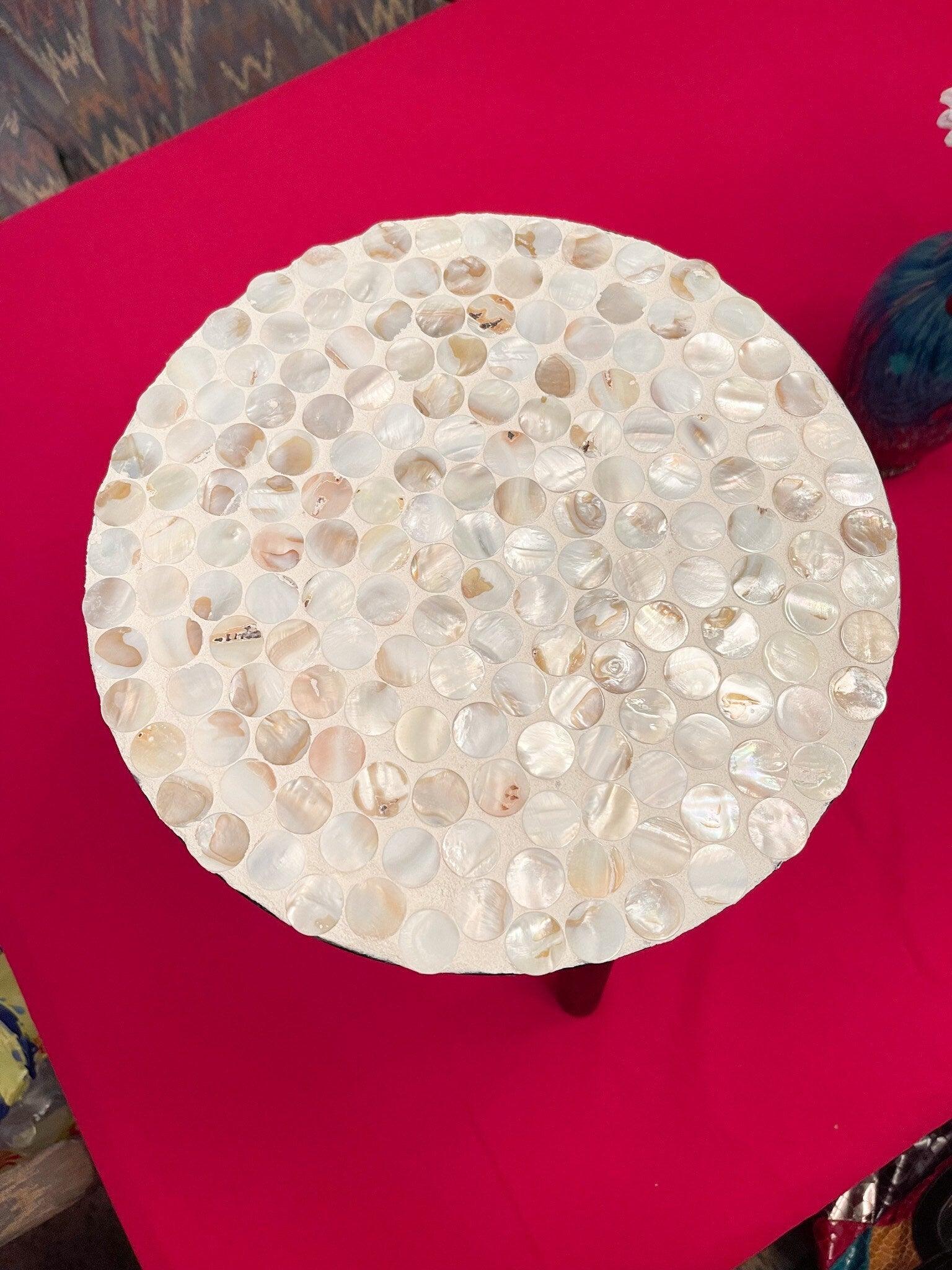 Tall Capiz shell mosaic plant stand featuring a cylindrical design with a decorative shell pattern for indoor or outdoor use.