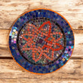 Handcrafted round mosaic wall art with colorful tile patterns, suitable for home decor and wall decorating.