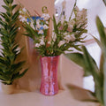Handcrafted pink disco ball mirror vase with reflective surface and decorative design, perfect for modern home decor.