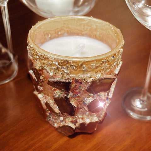 Handmade eucalyptus scented candle in hand crafted gold mosaic glass jar.