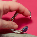 Deep blue glass cuff bracelet with smooth, rounded edges and a polished finish, designed by My Store.