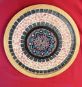 Handcrafted circular mosaic mandala wall art with colorful intricate patterns, perfect for decorative wall decor.