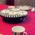 Daisy floral mosaic art cake plate with colorful flower patterns, made of ceramic, designed for serving desserts or decorative display.