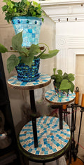 Three-tier Azure mosaic plant stand with metal frame and decorative blue tiles, perfect for displaying potted plants indoors or outdoors.