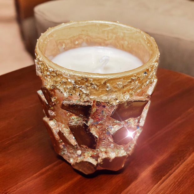 Handmade eucalyptus scented candle in hand crafted gold mosaic glass jar.