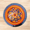 Decorative mid-century modern mosaic plate with colorful geometric patterns, showcasing intricate ceramic craftsmanship.