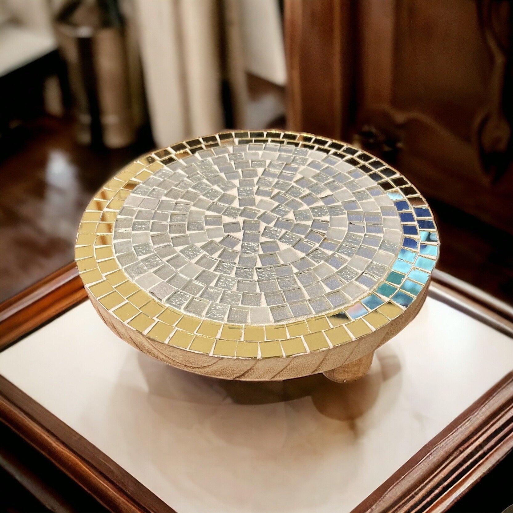 Handmade gold mirror and silver glass mosaic decorative plate with intricate design and reflective surface.