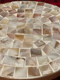 Handmade mother of pearl mosaic plant stand with intricate design, perfect for displaying indoor or outdoor plants.