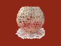Handcrafted Mother of Pearl Mosaic Oval Vase with intricate iridescent pattern, showcasing elegant craftsmanship and decorative design.