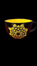 Handpainted extra large coffee mug with colorful floral design, perfect for morning beverages.