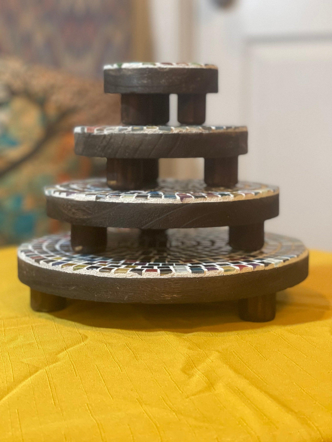 Handcrafted 4-tier mosaic plant stand set with colorful tiled shelves for indoor and outdoor plants.
