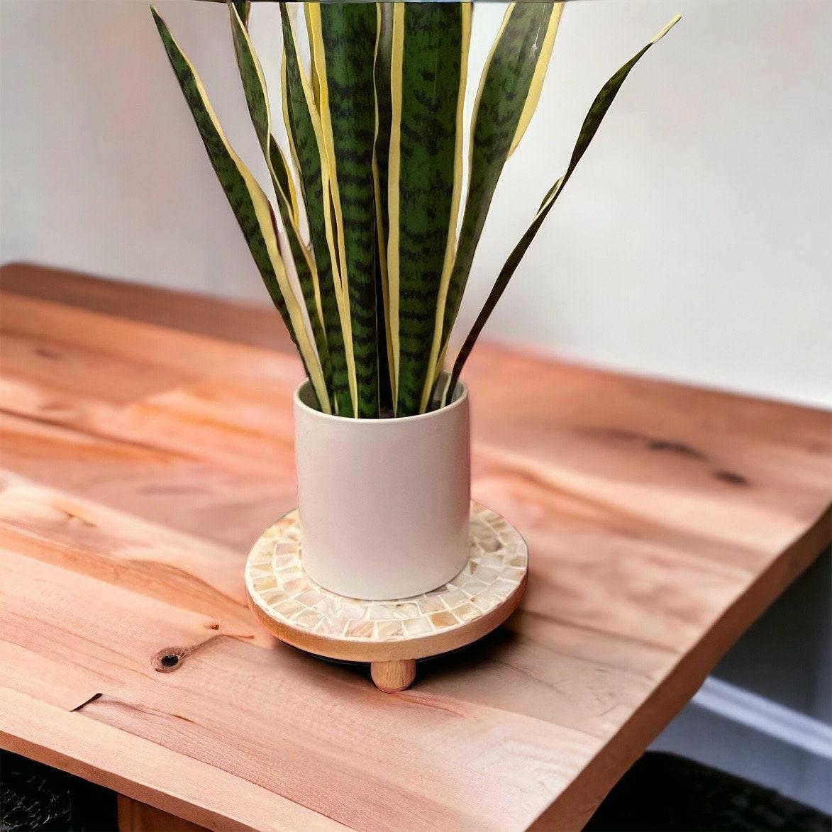 Handmade Mother of Pearl mosaic plant stand with intricate design, showcasing natural stone in a stylish, decorative piece.