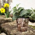 Handcrafted bronze and pearl mosaic planter with intricate design, perfect for indoor or outdoor decorative plants.