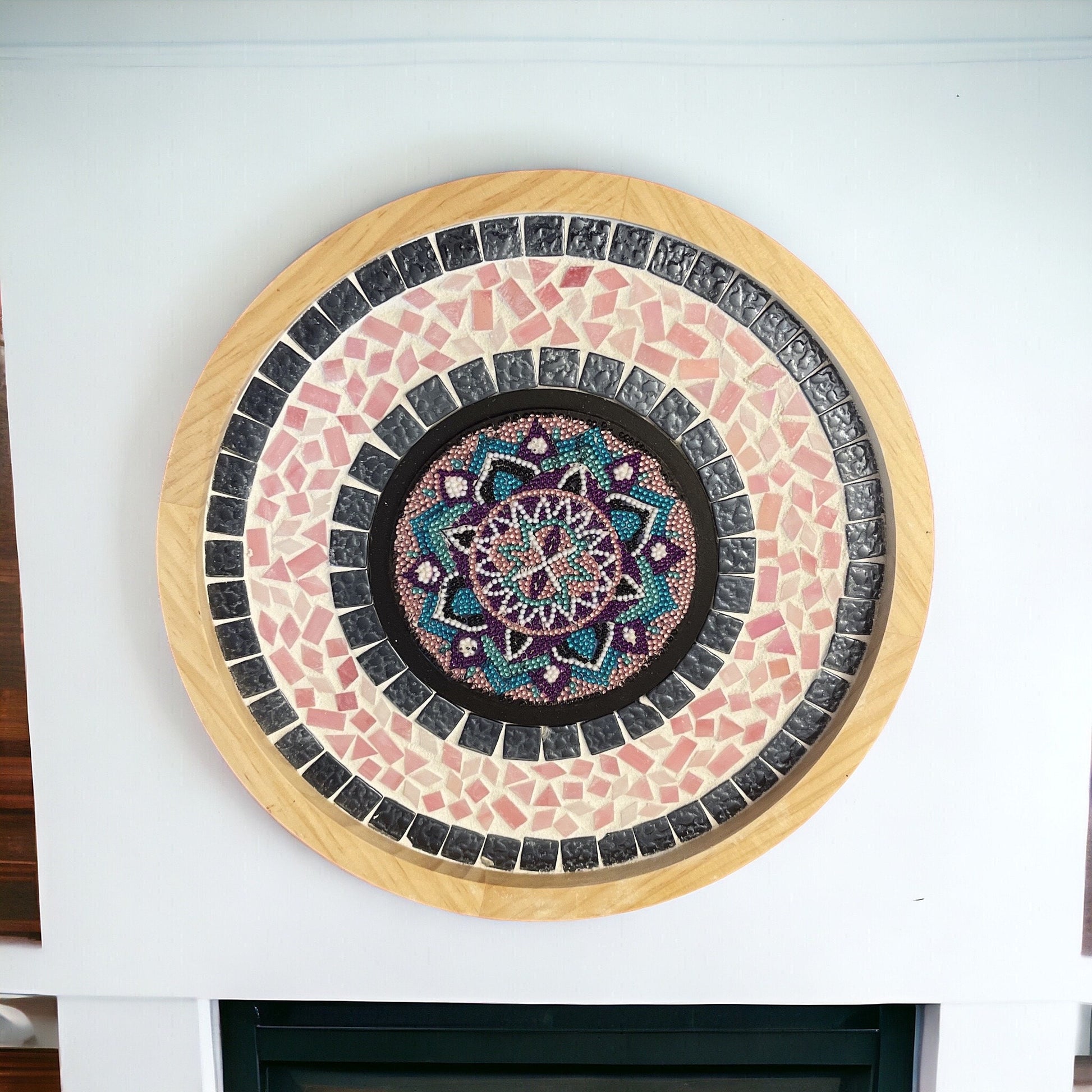 Handcrafted circular mosaic mandala wall art with colorful geometric patterns, ideal for home decor and wall decoration.