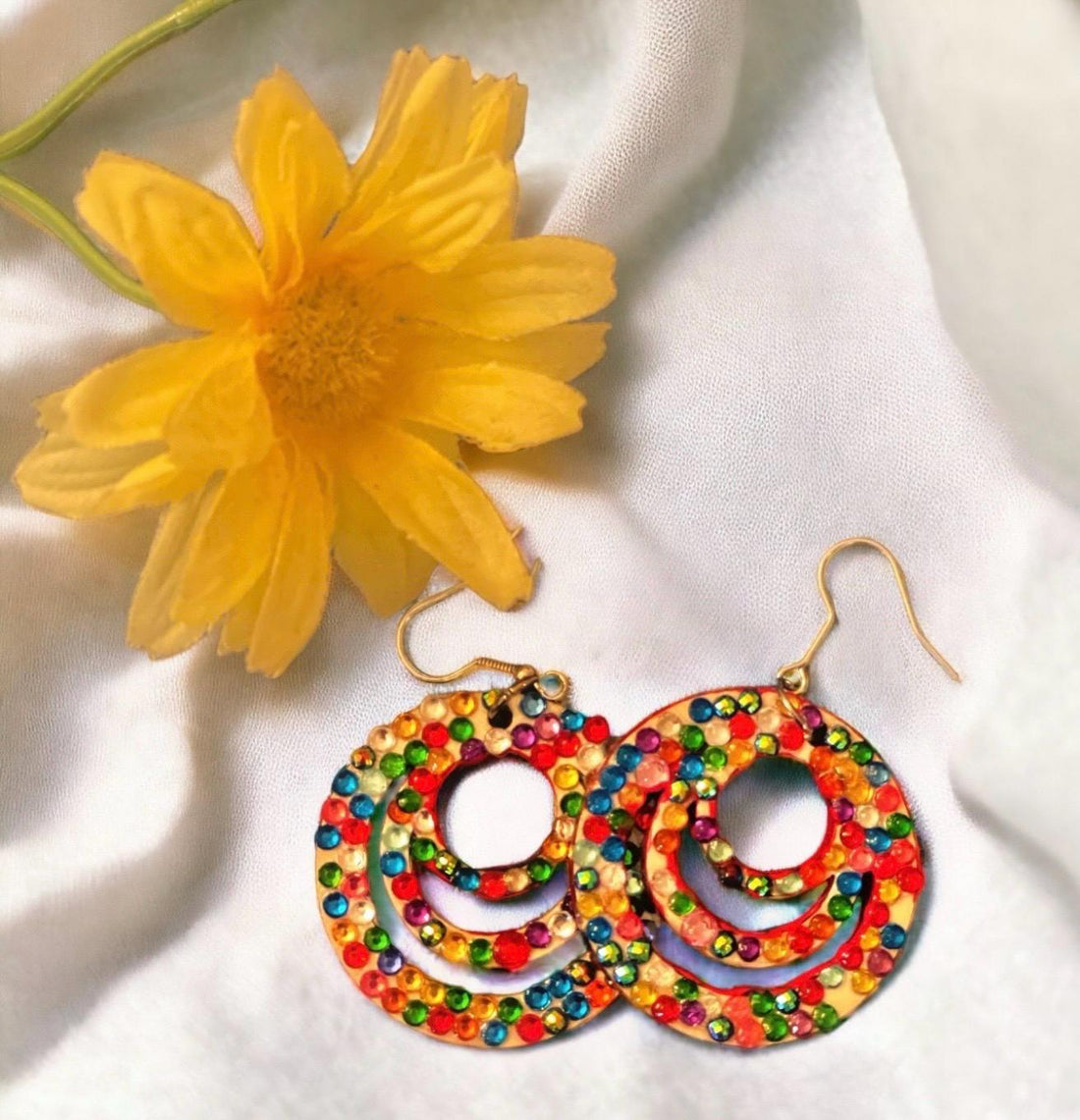 Multicolored crystal on wood hoop earrings with a natural finish, stylish and lightweight jewelry accessory.