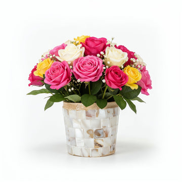 Handcrafted Mother of Pearl mosaic planter by Miss Bette's Creations, featuring intricate pearl inlay and a decorative plant container.