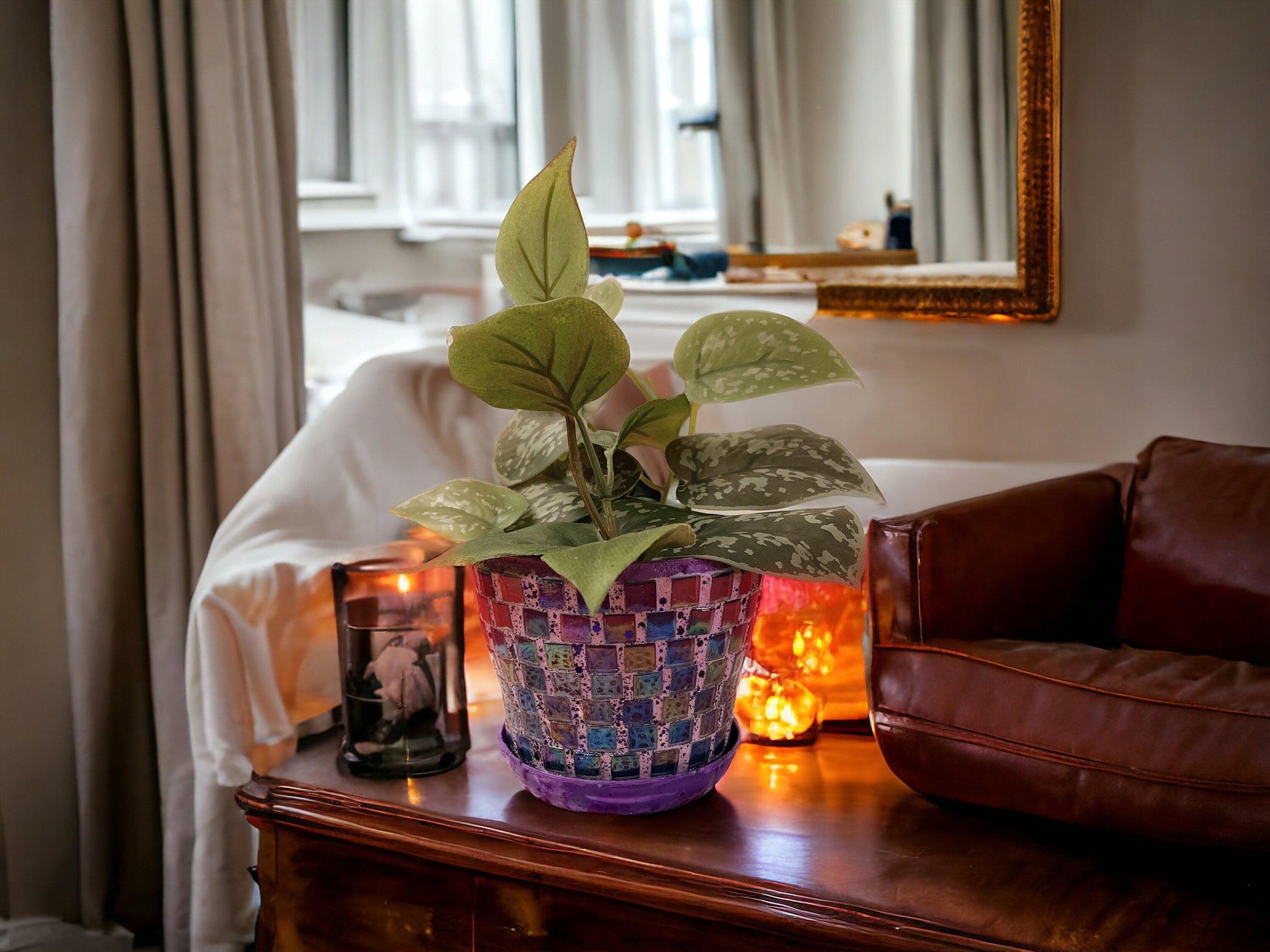 Purple and green mosaic flower pot with floral design, decorative ceramic planter for indoor or outdoor plants.